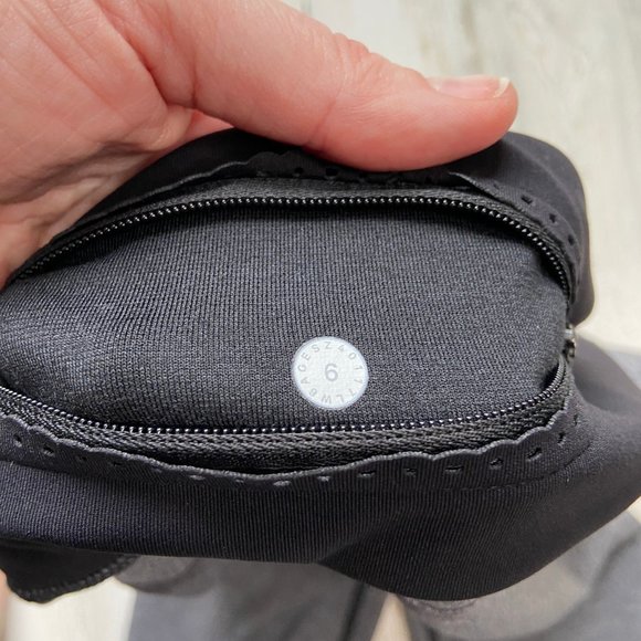 CLEARANCE! Lululemon Size 6 Small Smooth Stride Crop Leggings Heathered Black - Picture 10 of 11